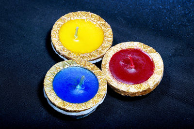 High angle view of fruits on table against black background