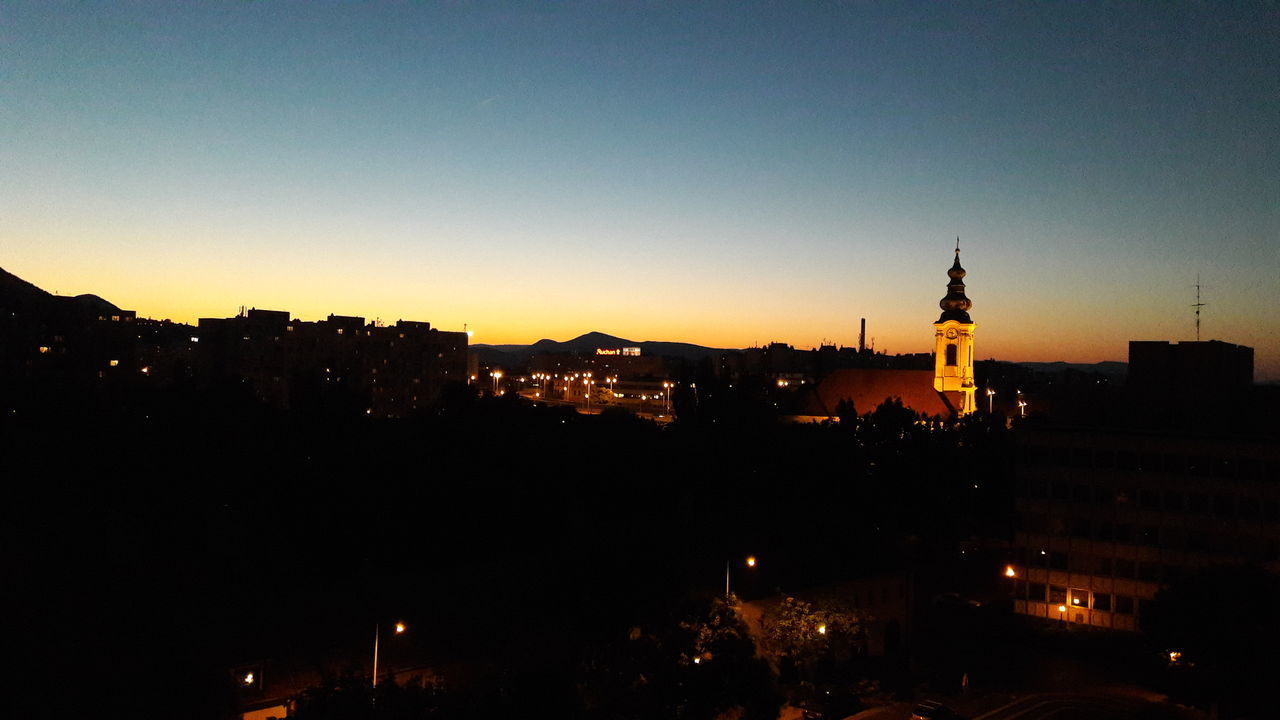 VIEW OF CITY AT NIGHT