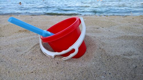 High angle view of sunglasses on beach