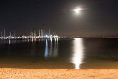 Boats moored in sea