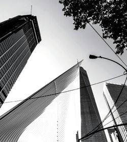 Low angle view of office building against sky