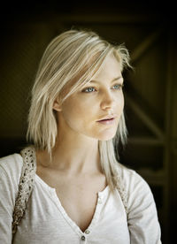 Close up of beautiful young woman looking away