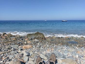 Scenic view of sea against clear sky