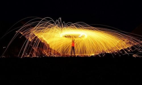 Firework display at night