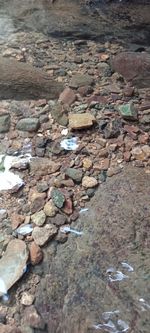 High angle view of stones on beach