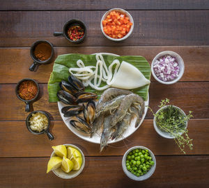 Directly above shot of food on wooden table in kitchen