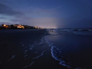 Scenic view of sea against sky at sunset