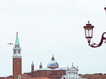 High section of building against clear sky