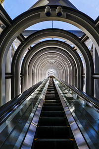 Low angle view of escalator in building