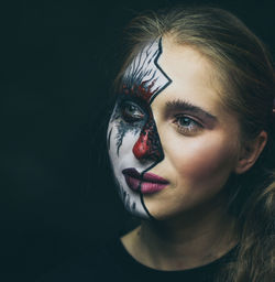 Close-up portrait of a young woman with eyes closed