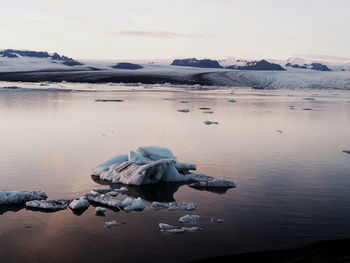 Scenic view of frozen sea against sky