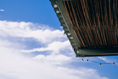 Low angle view of buildings against blue sky