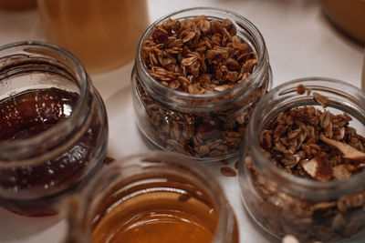 Glass jars with natural flower honey and oatmeal. organic natural and raw food