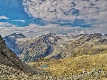 Scenic view of snowcapped mountains against sky