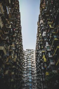 Low angle view of buildings against clear sky