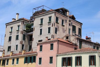 Low angle view of residential building against sky