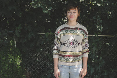 Portrait of a young woman outdoors