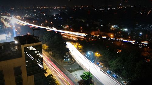 High angle view of illuminated city at night