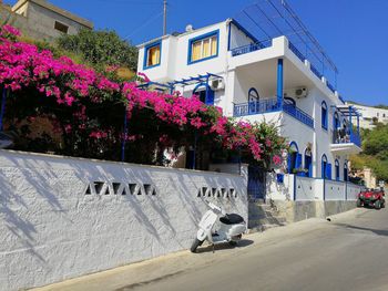 View of street and buildings against sky