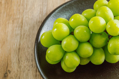 High angle view of fruits in bowl on table