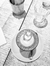 High angle view of coffee cup on table