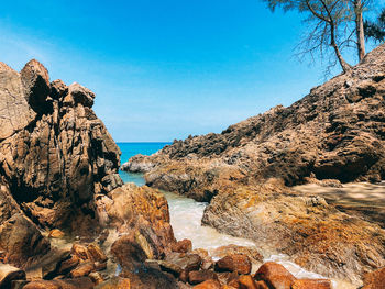 Scenic view of sea against clear blue sky