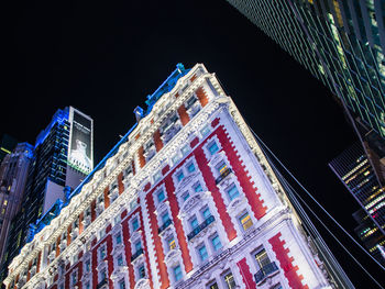 Low angle view of buildings at night