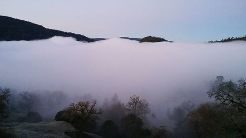 Scenic view of mountains against sky during winter