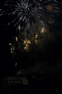 Firework display at night