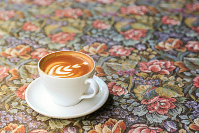 Coffee cup on table