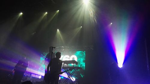 Panoramic view of crowd at music concert