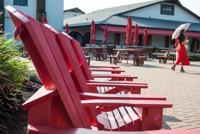 Man in red chairs