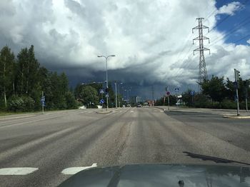 Road against cloudy sky