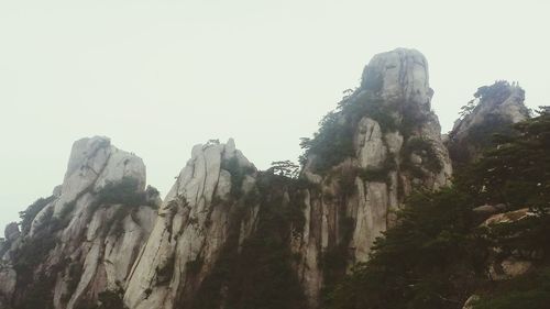 Low angle view of rocky mountains