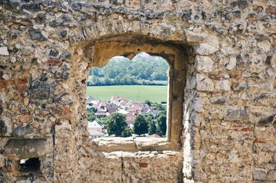 View of historical building through window