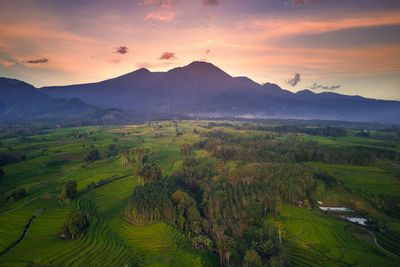 Scenic view of landscape against sky during sunset