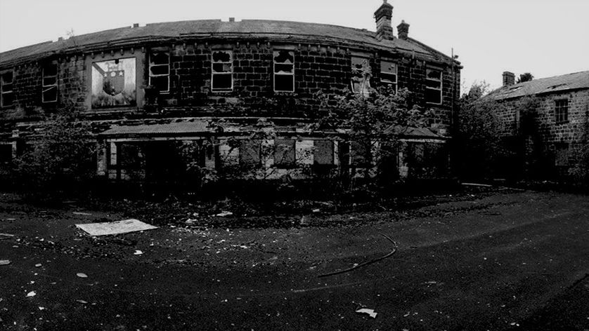 building exterior, architecture, built structure, building, window, street, residential building, house, residential structure, abandoned, city, day, outdoors, old, transportation, road, no people, damaged, obsolete, clear sky