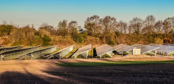 Built structure on field against clear sky