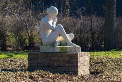 Statue against clear sky in park