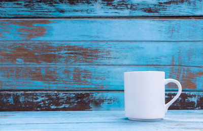 Close-up of coffee cup on table