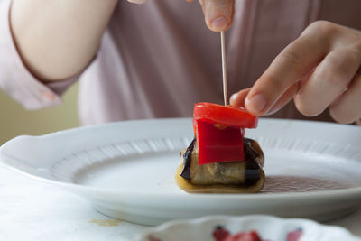 Close-up of woman preparing food