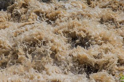 Churning flood waters.