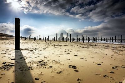 Scenic view of beach against sky