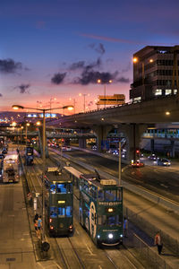 Cars on road in city at night