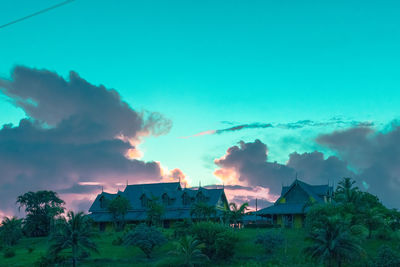 Buildings against sky during sunset