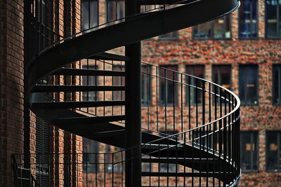 Close-up of bridge against building