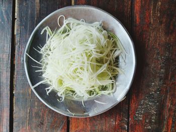 High angle view of rice in bowl on table