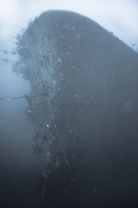 Scenic view of sea against sky during winter