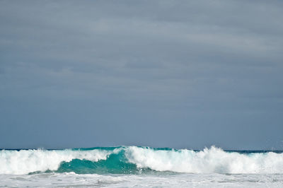Scenic view of seascape against cloudy sky