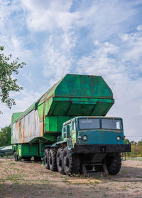 Train on field against sky